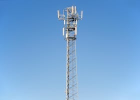 pexels-photo-94844-94844 A tall cell tower set against a clear blue sky, representing modern communication technology.